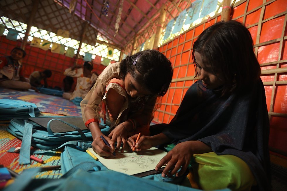 Somira at the school she attends in a makeshift refugee camp in Bangladesh