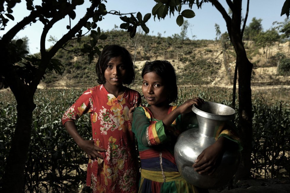 Somira and her sister Asia in a refugee camp in Bangladesh