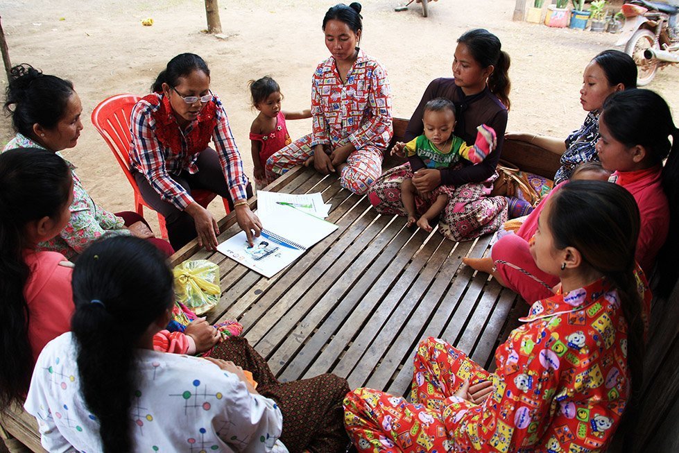 CARE has been working with the traditional birth attendants and health volunteers in Sina’s village so they can give pregnant women accurate information about staying healthy. Photo: Sok Vichheka/CARE