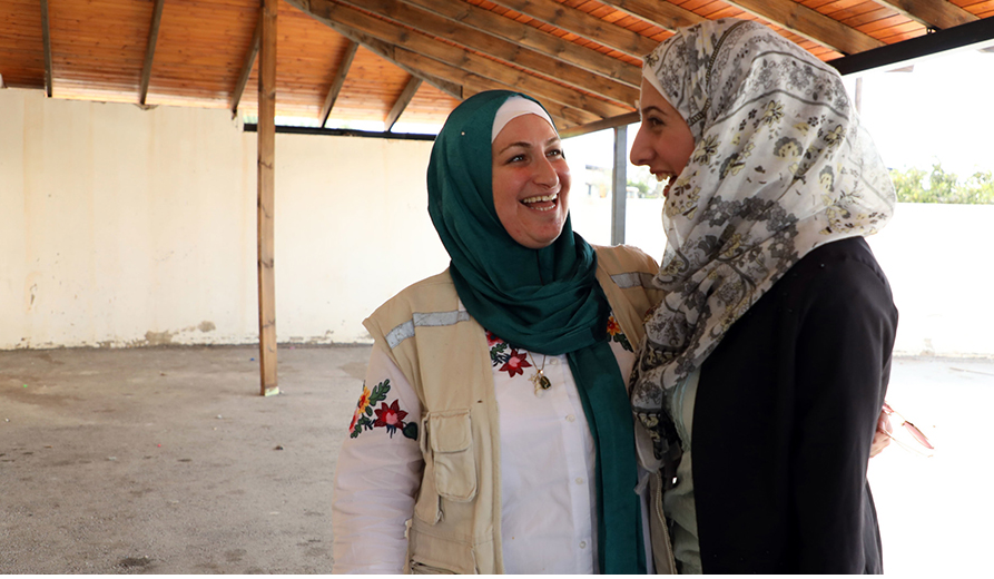 May with one of the women in the eco-farm co-op that CARE is supporting in the West Bank. Laura Banks/CARE