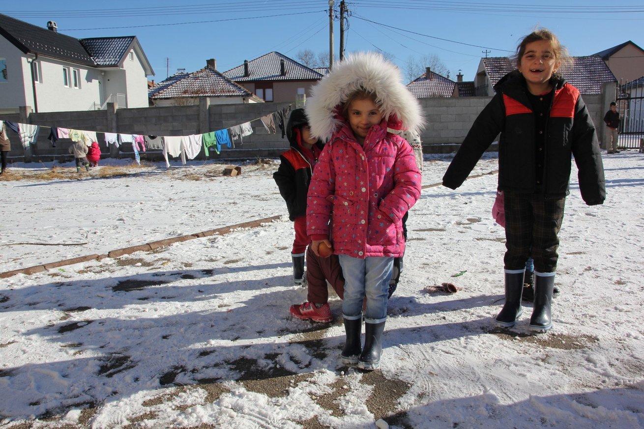 Refugee children playing in the snow in Sjenica