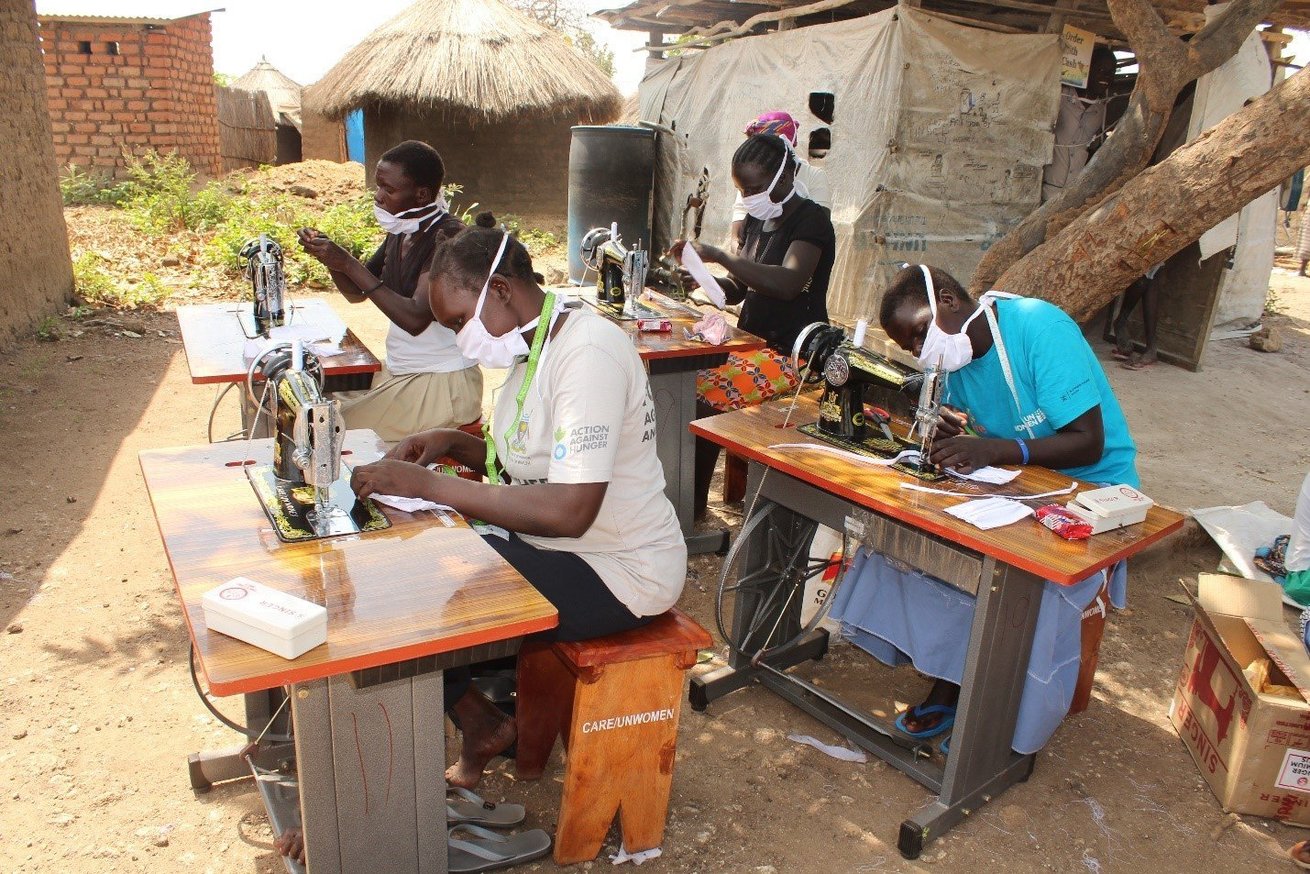 Members of the Gloden Star women's tailoring group in Uganda now producing masks for their community