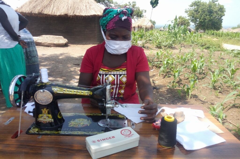 Refugee women making masks in Uganda