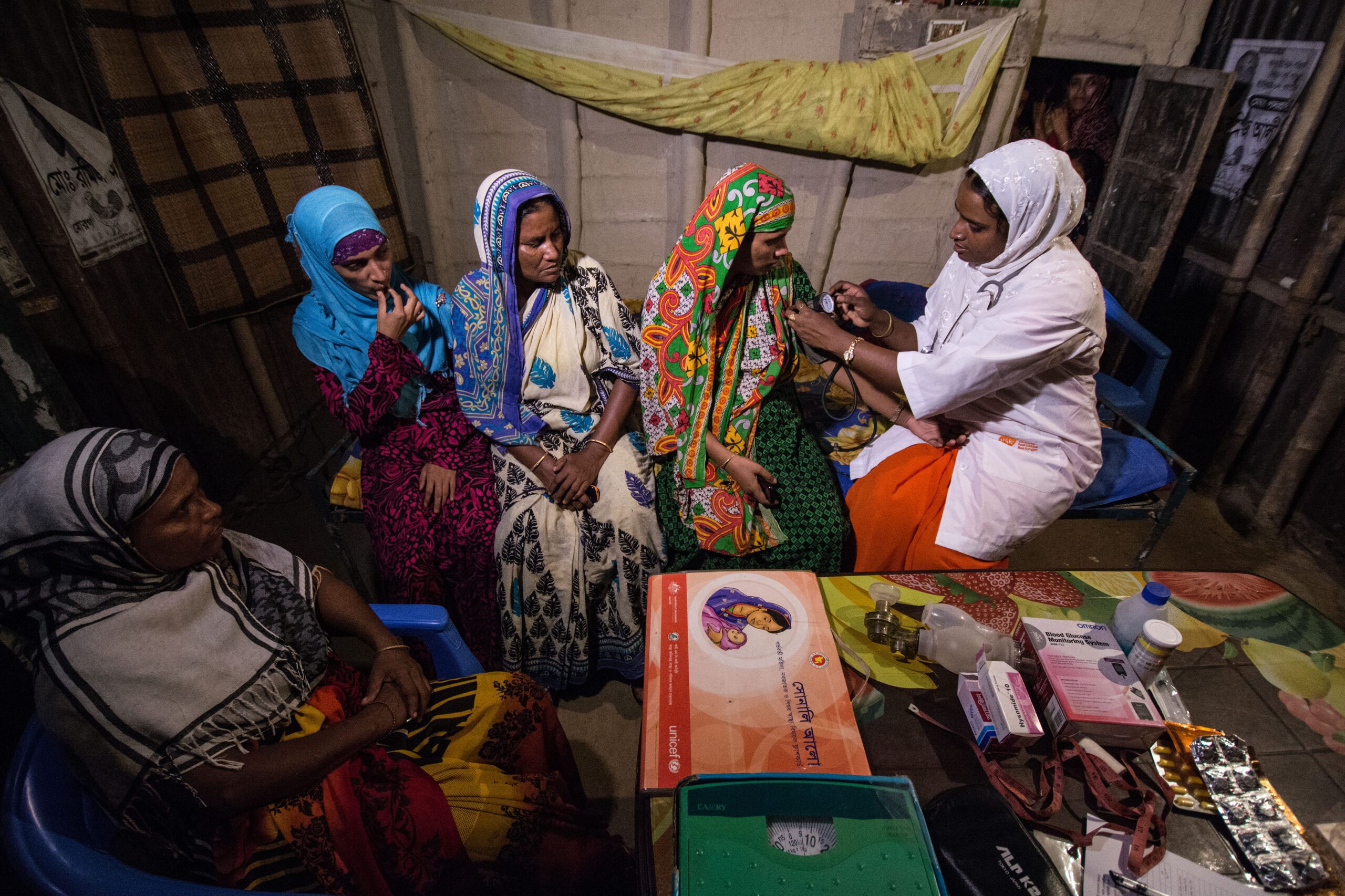 A community health worker with a group of women in Bangladesh. 