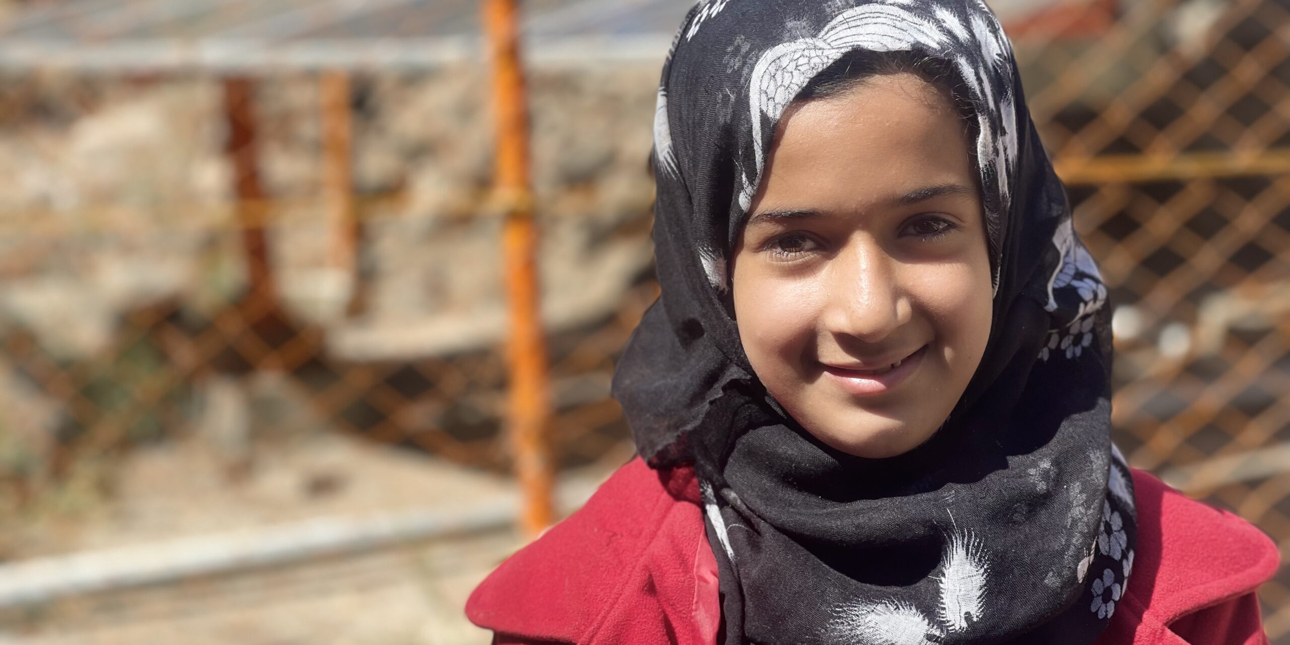 Girl smiling wearing a hijab