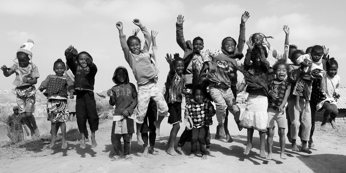 Group of children jumping (black and white)